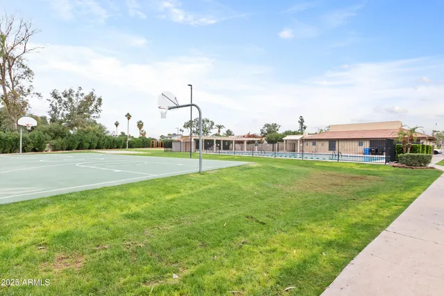 a view of a park with swings