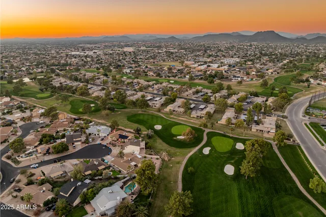an aerial view of a city with lots of residential buildings