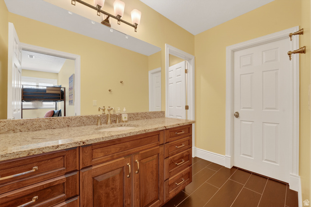 714 Draper Heights Way Draper, UT 84020 - Photo 65 of 88 Bathroom with vanity and baseboards