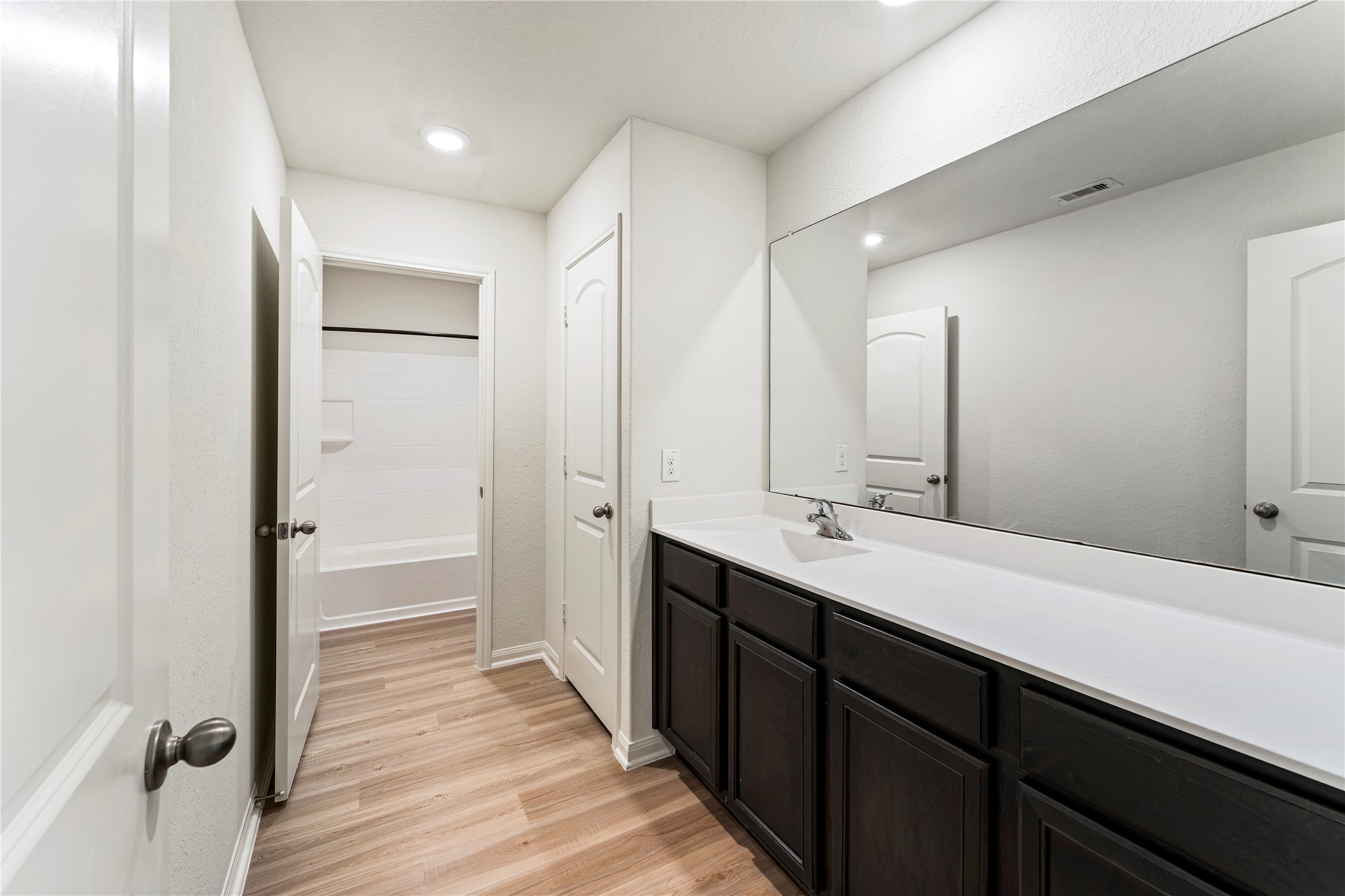 9702 Opal Gates Drive Rosharon, TX 77583 - Photo 33 of 43 a bathroom with a double vanity sink mirror and double