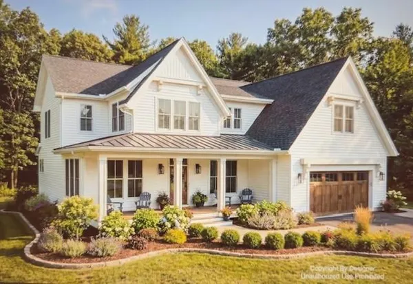 a front view of a house with a yard outdoor seating and yard