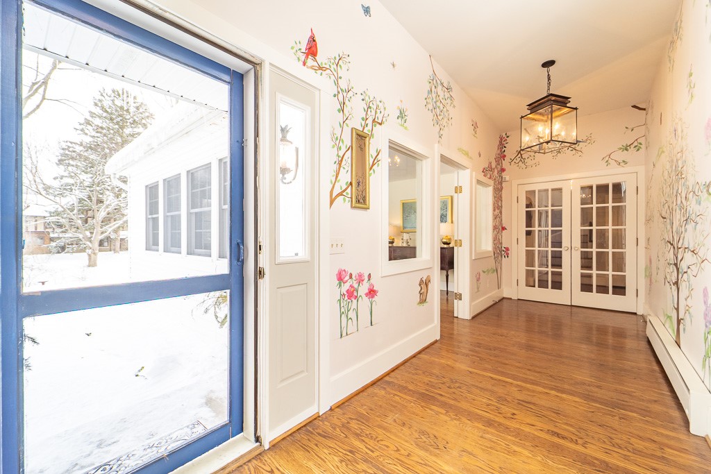 1237 Clover Street Brighton, NY 14610 - Photo 27 of 50 Double French doors separate this area from the ma
