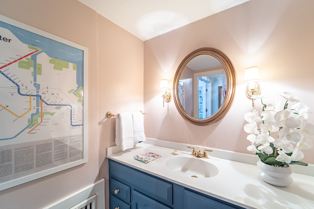 1237 Clover Street Brighton, NY 14610 - Photo 28 of 50 A second first floor bathroom provides flexibility