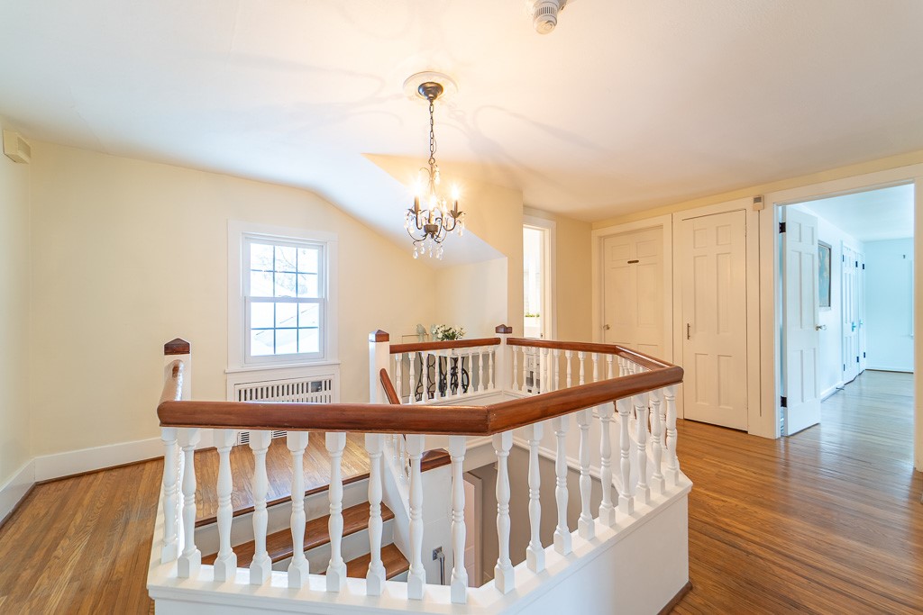1237 Clover Street Brighton, NY 14610 - Photo 31 of 50 Graceful spindles flank the top of the staircase.