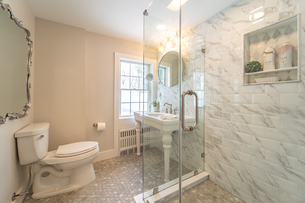 1237 Clover Street Brighton, NY 14610 - Photo 35 of 50 The beautifully updated en-suite bath has glass sh