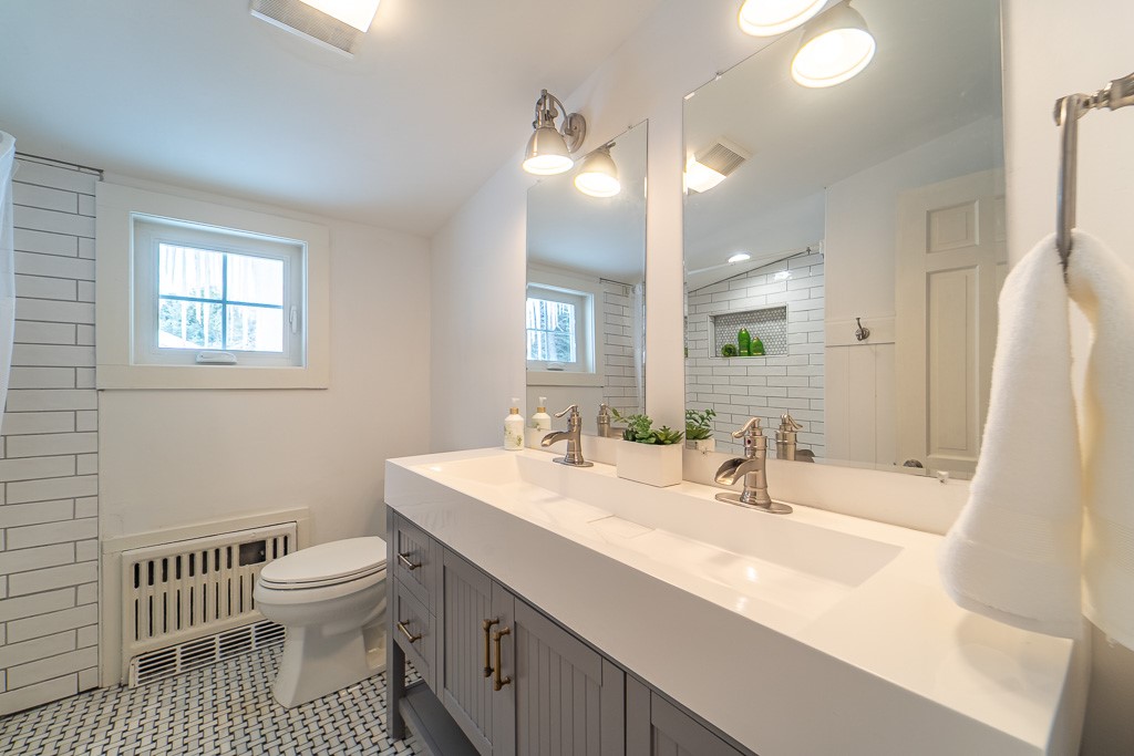 1237 Clover Street Brighton, NY 14610 - Photo 38 of 50 The family bath has been updated with classic bask