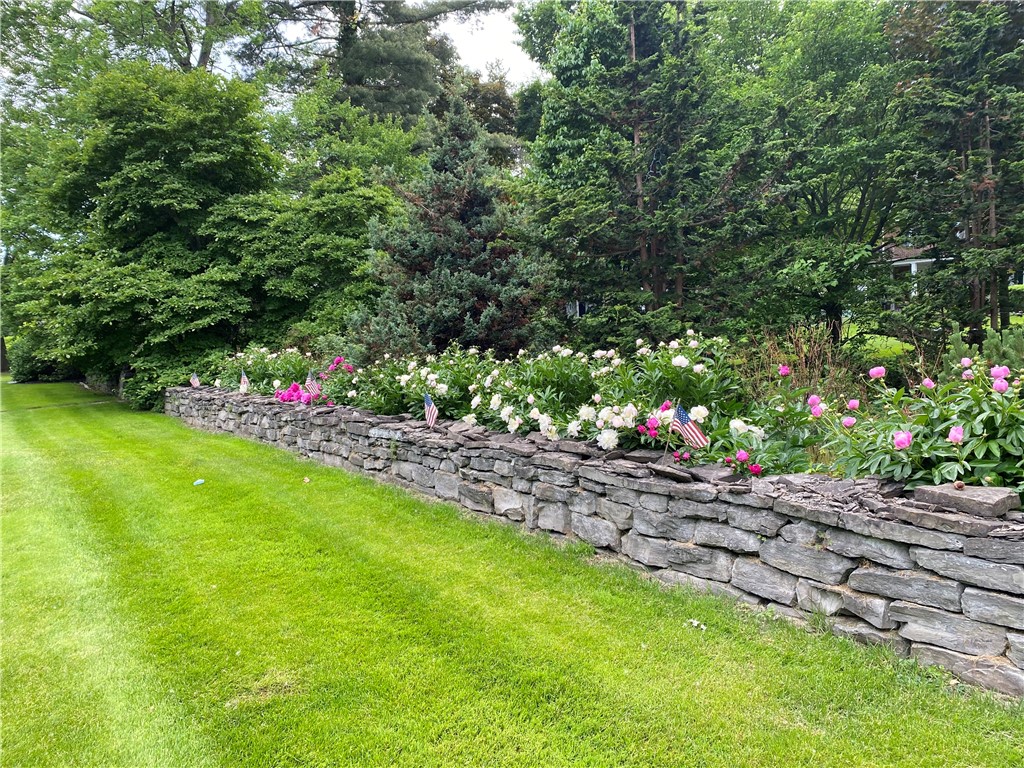 1237 Clover Street Brighton, NY 14610 - Photo 46 of 50 A picturesque stone wall frames this scenic settin