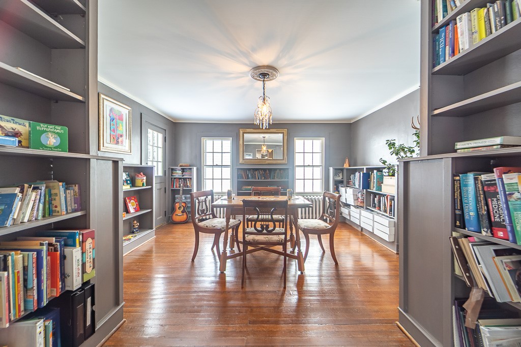 1237 Clover Street Brighton, NY 14610 - Photo 7 of 50 The library is lined with shelves for cherished bo