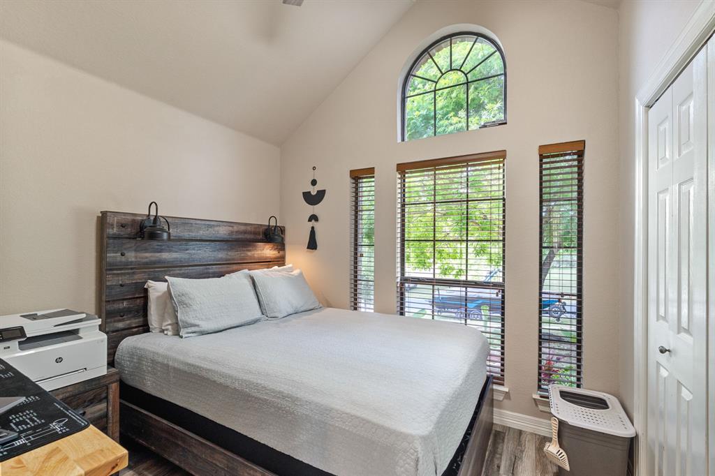 15508 Checotah Drive Austin, TX 78734 - Photo 17 of 23 a bedroom with a bed and a window