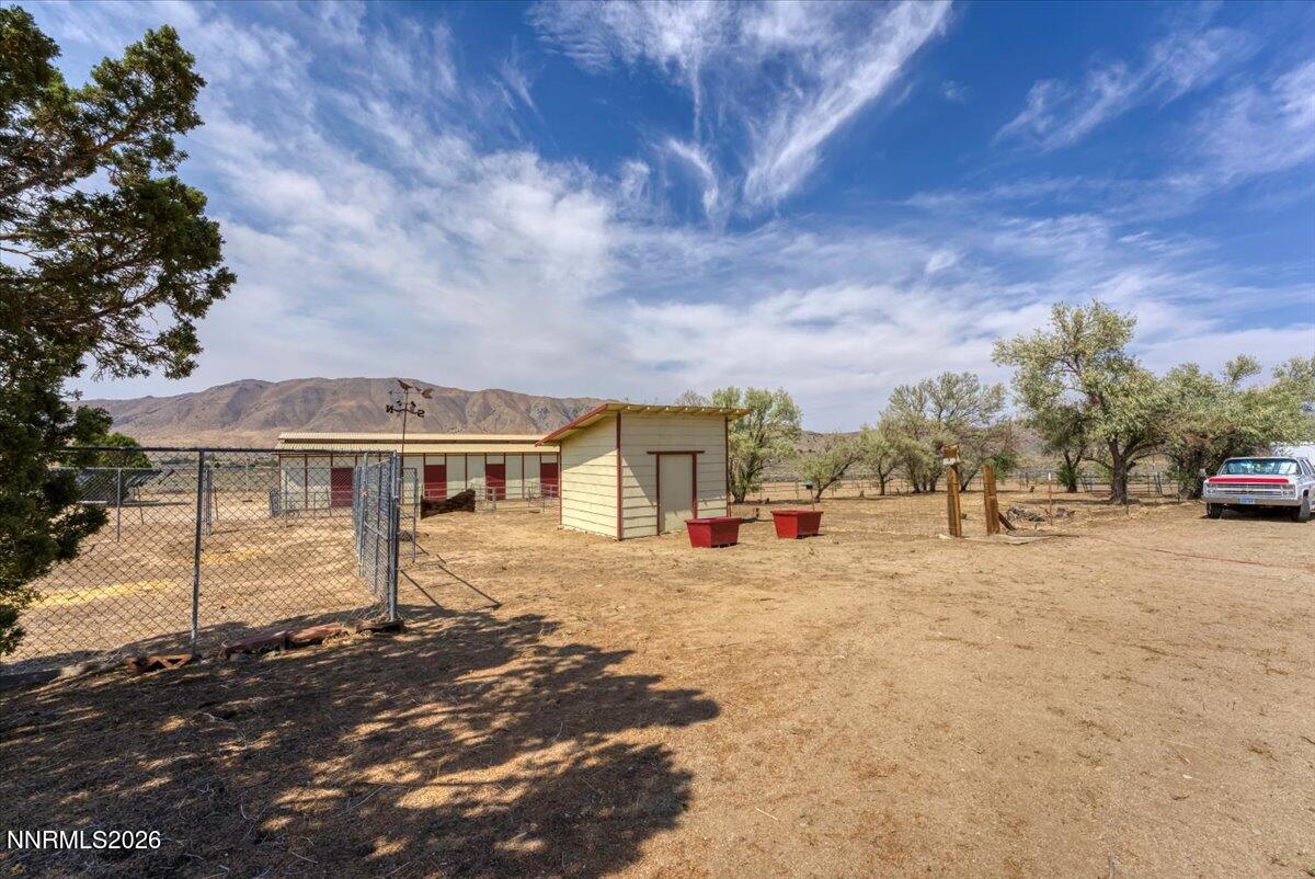 1220 Mineral Flat Road Reno, NV 89506 - Photo 27 of 50 front view of a house with a yard