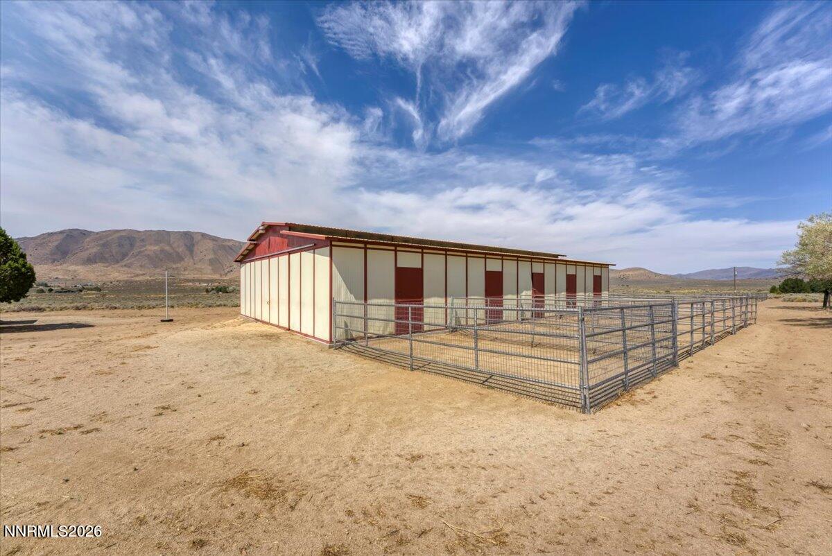 1220 Mineral Flat Road Reno, NV 89506 - Photo 29 of 50 a front view of a house with a yard