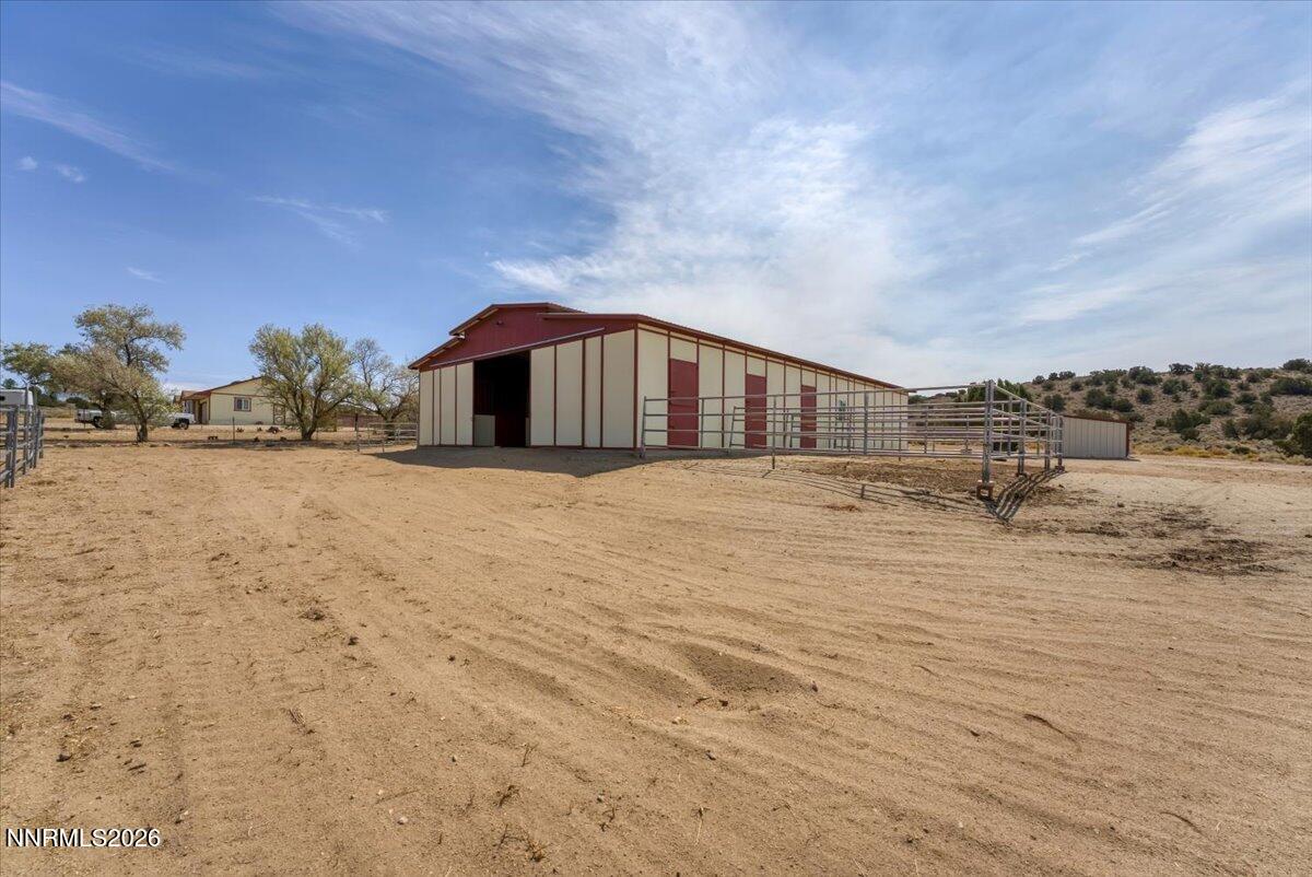 1220 Mineral Flat Road Reno, NV 89506 - Photo 34 of 50 a view of a house with a yard