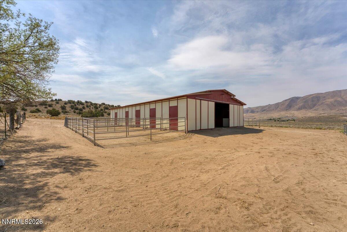 1220 Mineral Flat Road Reno, NV 89506 - Photo 36 of 50 a view of house with yard and sitting area