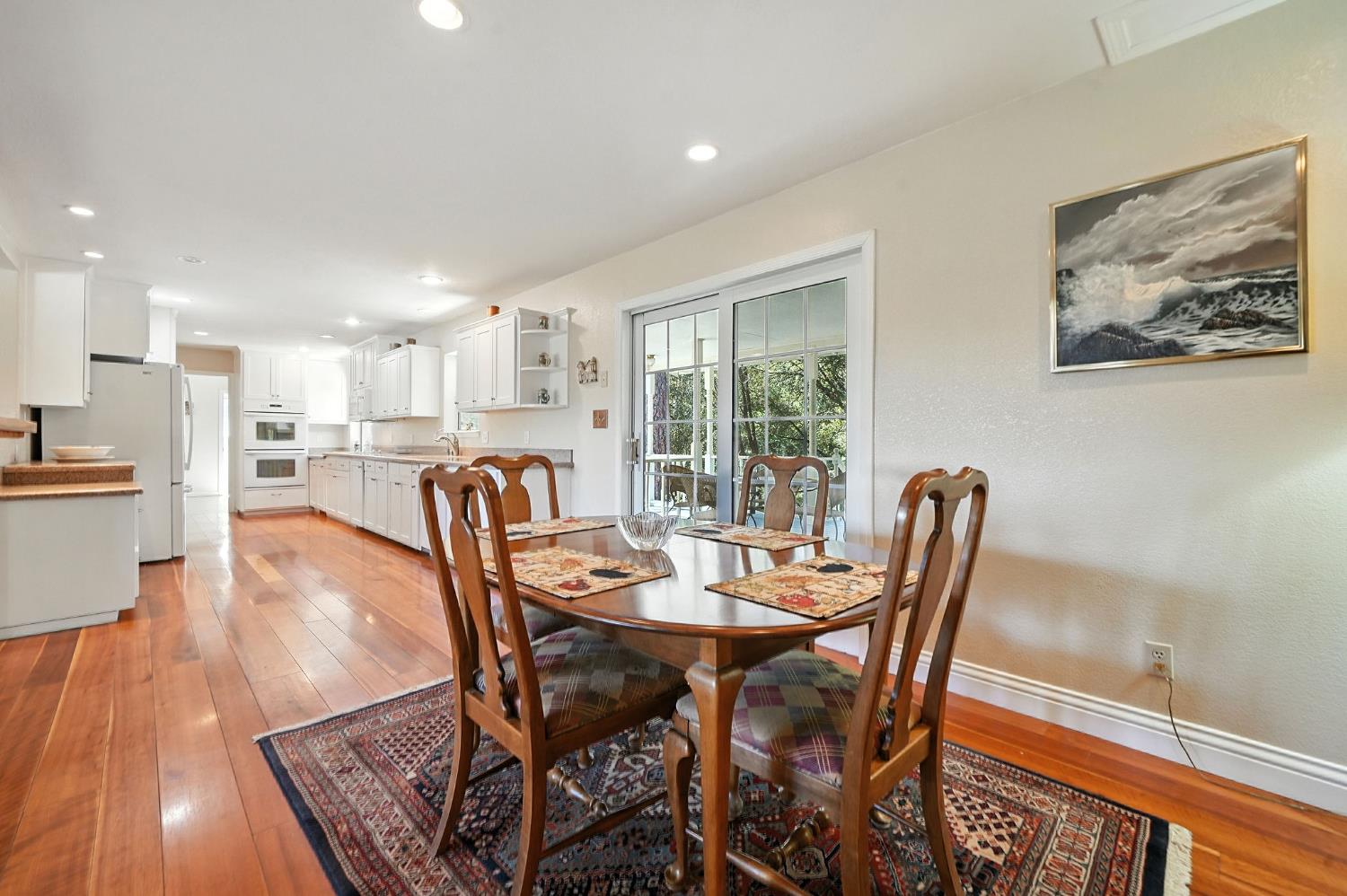 17050 Rams Horn Grade Road Volcano, CA 95689 - Photo 19 of 96 a view of a dining room with furniture window and wooden floor