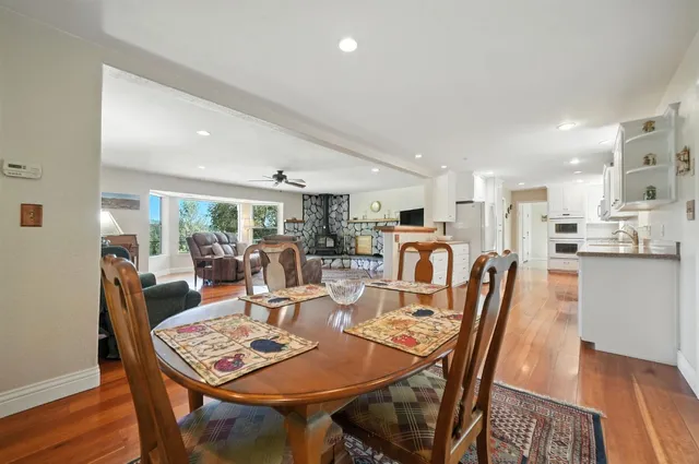 a bedroom with a bed and a tv on table