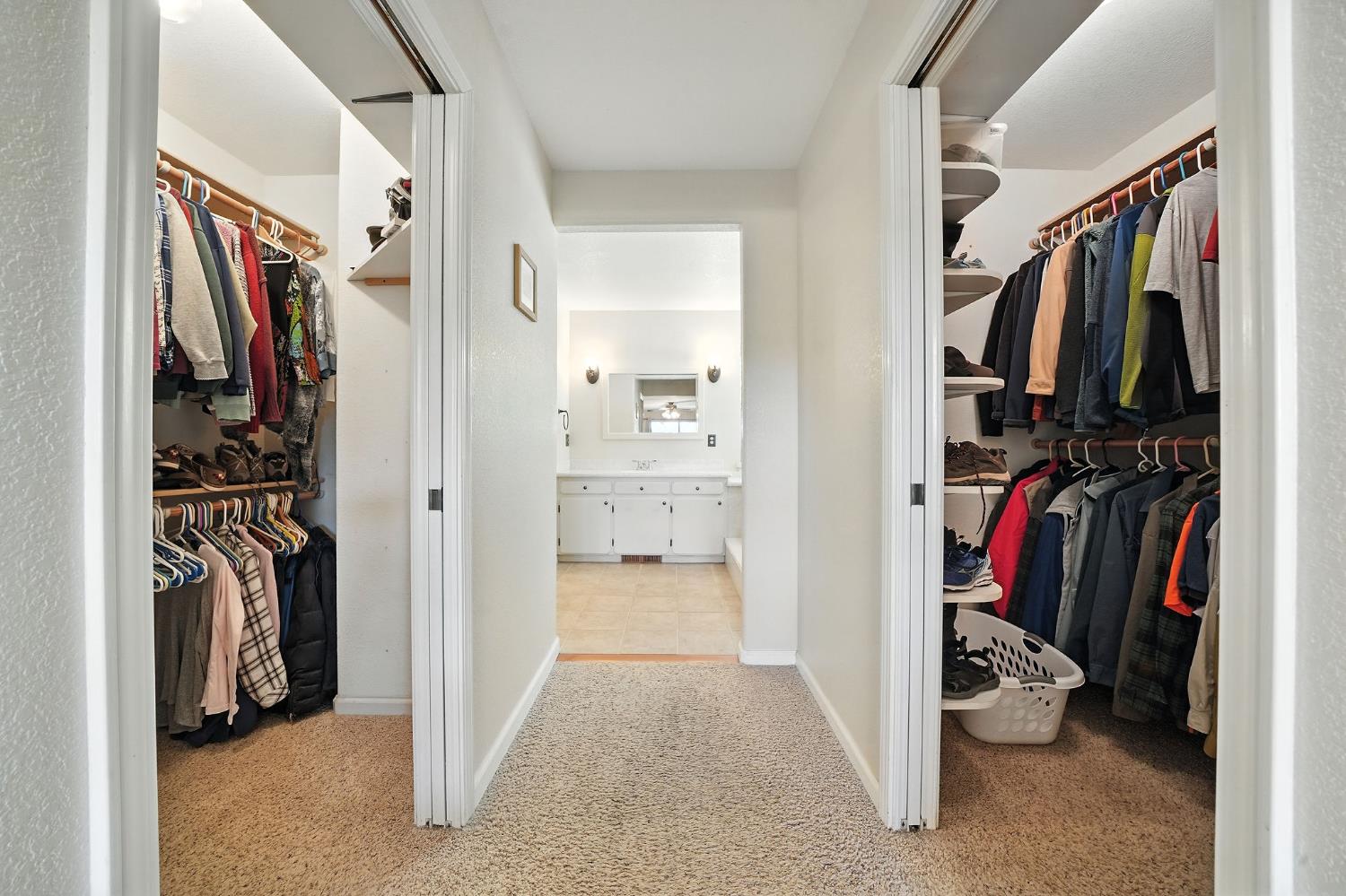 17050 Rams Horn Grade Road Volcano, CA 95689 - Photo 31 of 96 a view of walk in closet with clothes and shoes