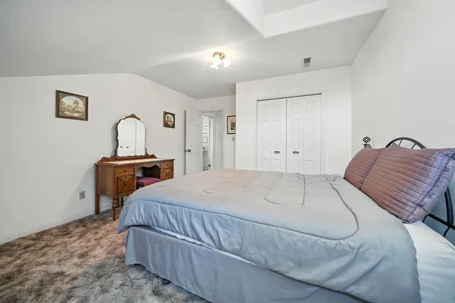 a front view of a house with yard patio and fire pit