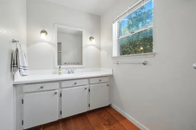 a view of a yard with a tree