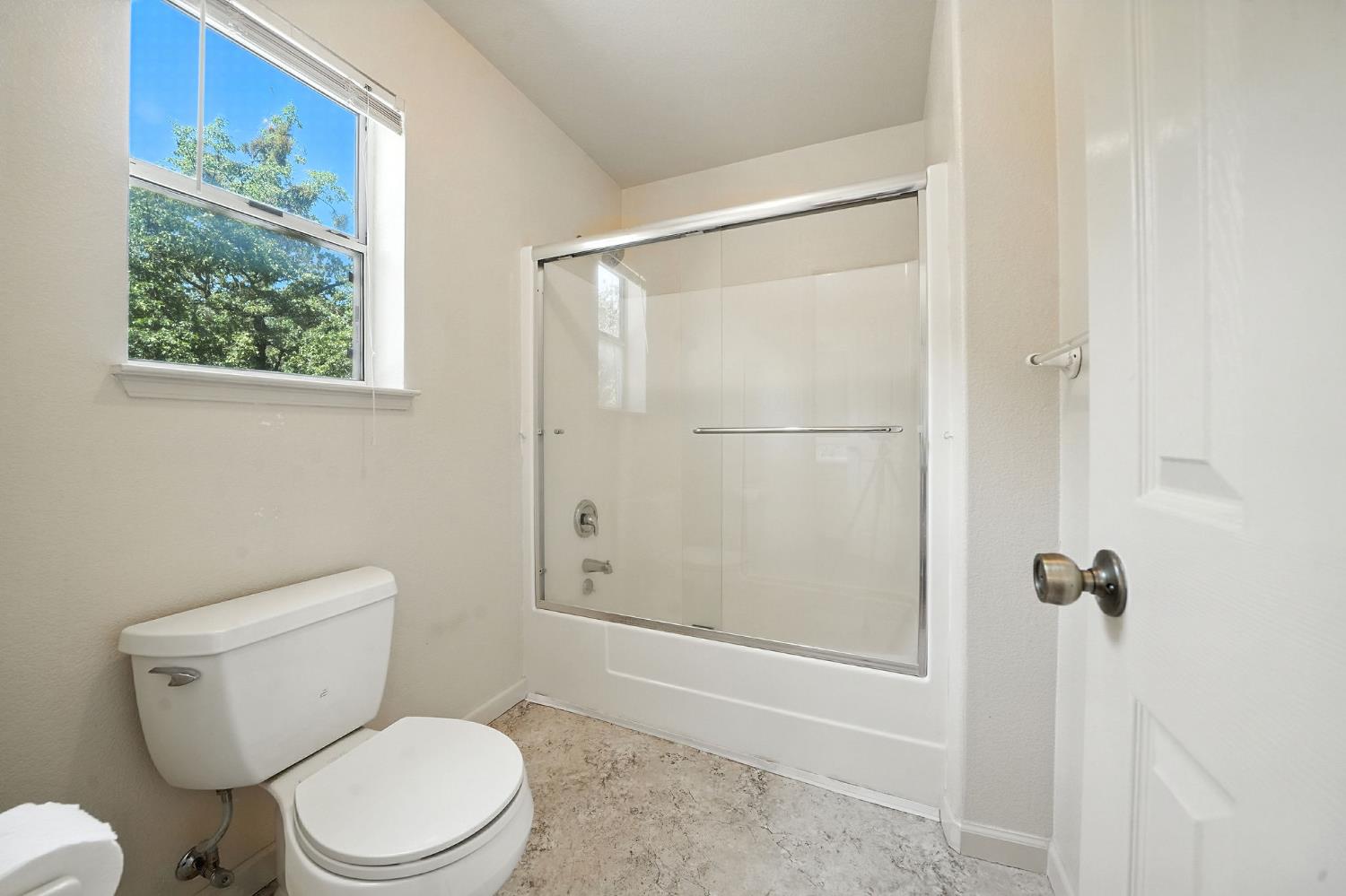 17050 Rams Horn Grade Road Volcano, CA 95689 - Photo 41 of 96 a white toilet sitting next to a bath tub shower