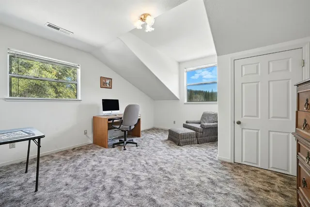 a view of a city with a mountain in the background