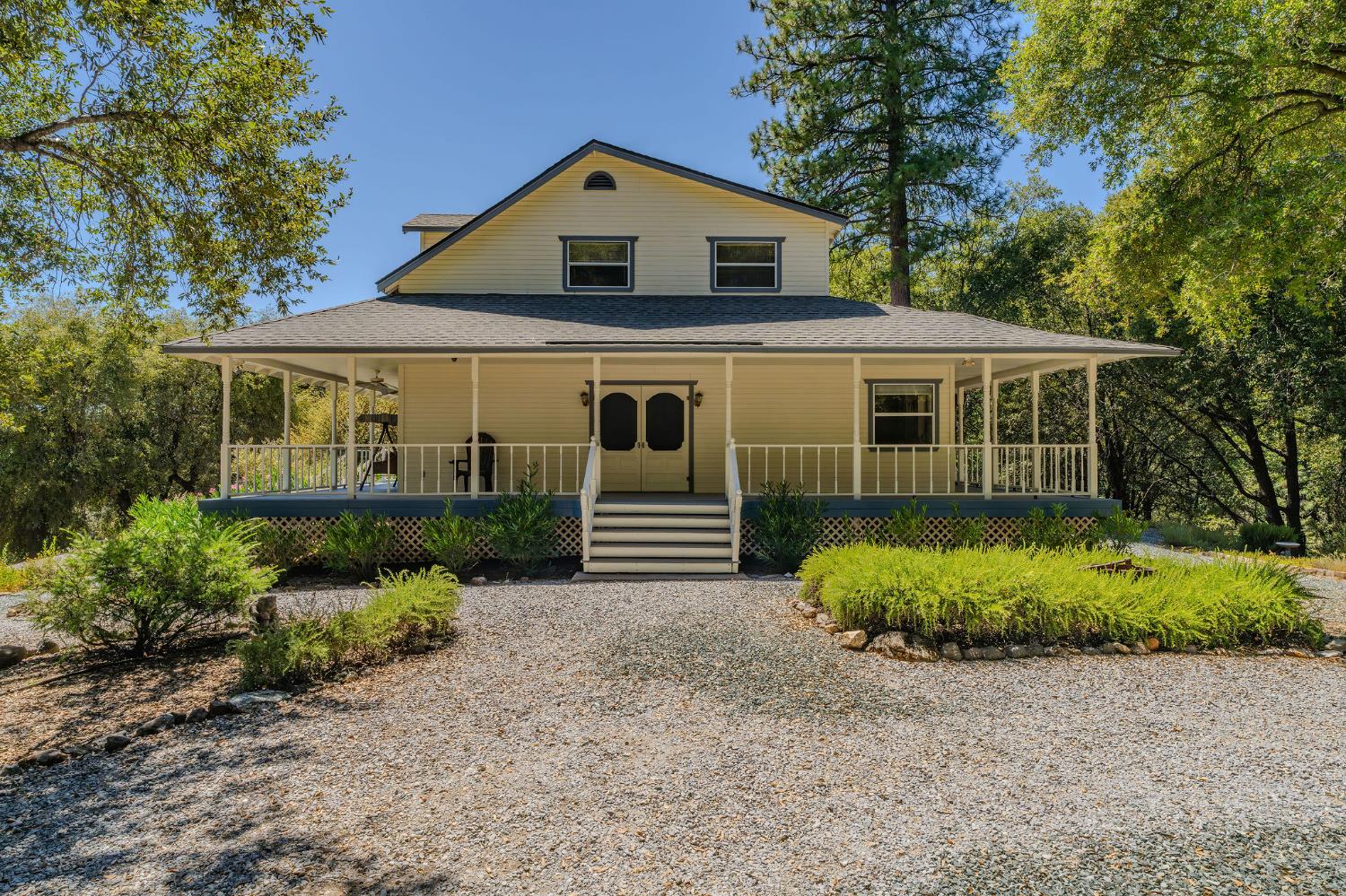 17050 Rams Horn Grade Road Volcano, CA 95689 - Photo 54 of 96 a front view of a house with a garden