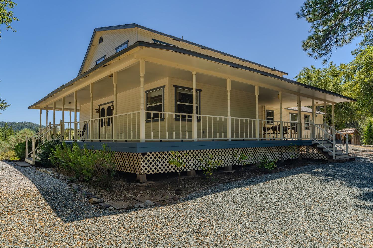 17050 Rams Horn Grade Road Volcano, CA 95689 - Photo 55 of 96 a front view of a house with a yard