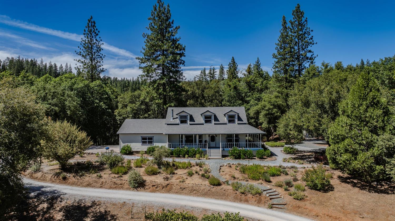 17050 Rams Horn Grade Road Volcano, CA 95689 - Photo 92 of 96 a front view of a house with a garden
