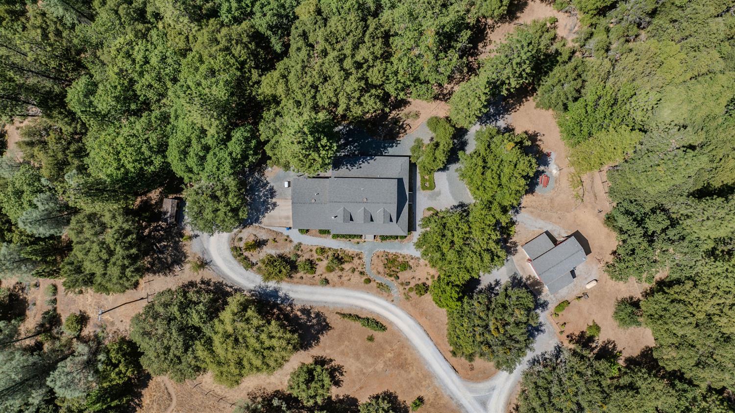 17050 Rams Horn Grade Road Volcano, CA 95689 - Photo 94 of 96 an aerial view of a house with a yard and garden