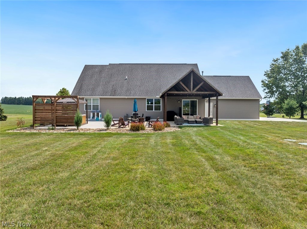 6517 Stone Road Medina, OH 44256 - Photo 42 of 47 View of front facade featuring an outdoor hangout area, a patio area, and a front yard