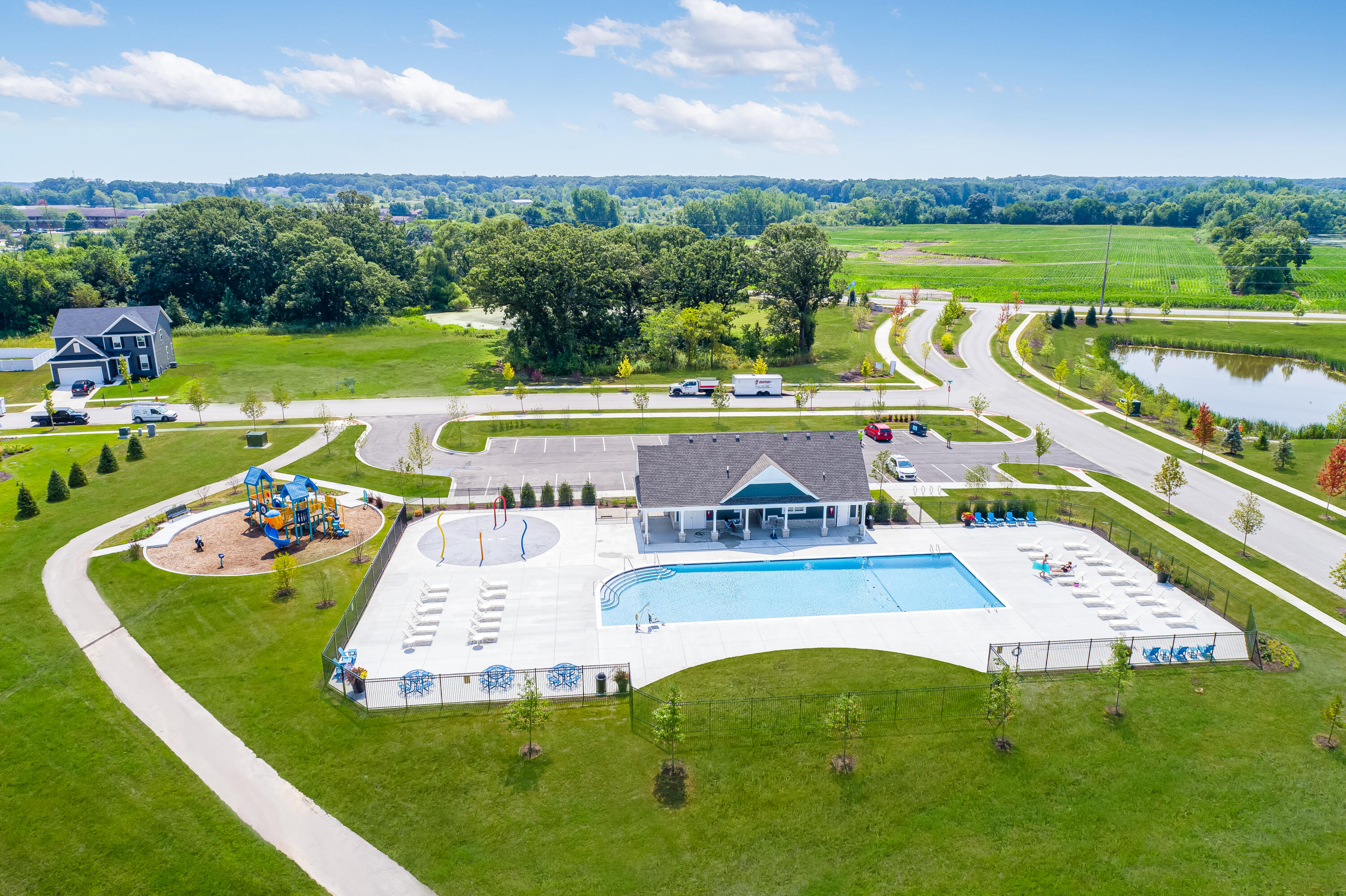 5984 East 112th Place Winfield, IN 46307 - Photo 22 of 41 a view of a table and chairs in the grass