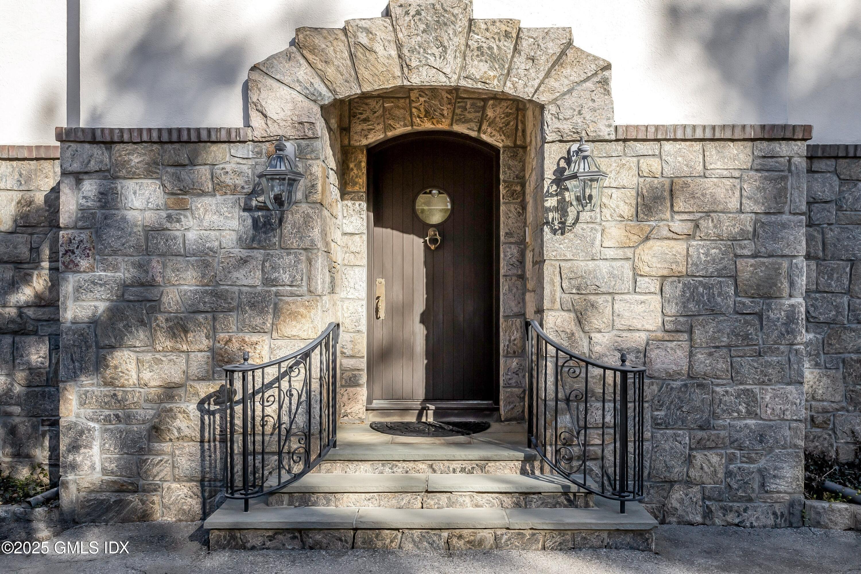 a front view of a house with a door
