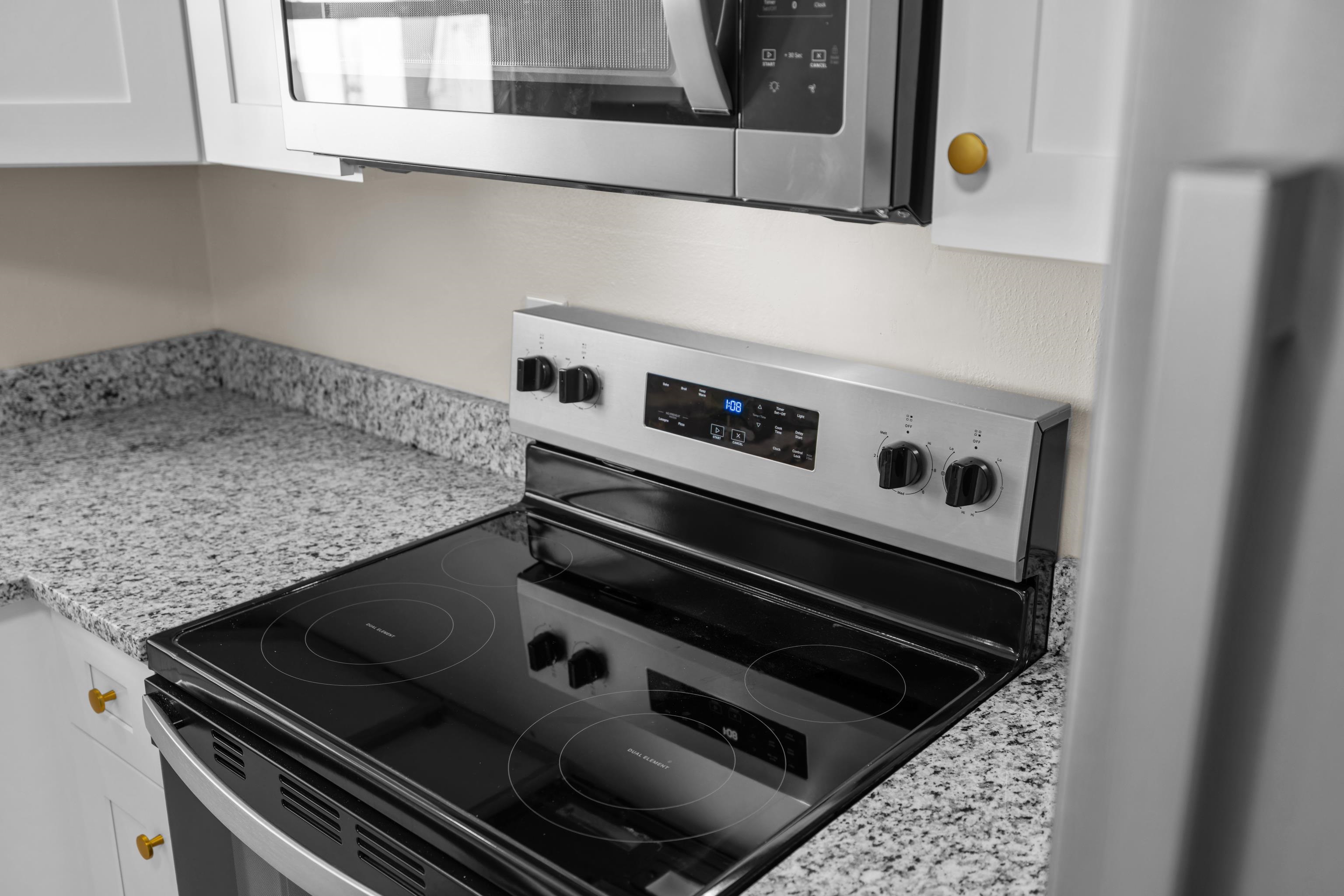 1726 Mountain Valley Road Keezletown, VA 22832 - Photo 11 of 63 a stove top oven sitting inside of a kitchen