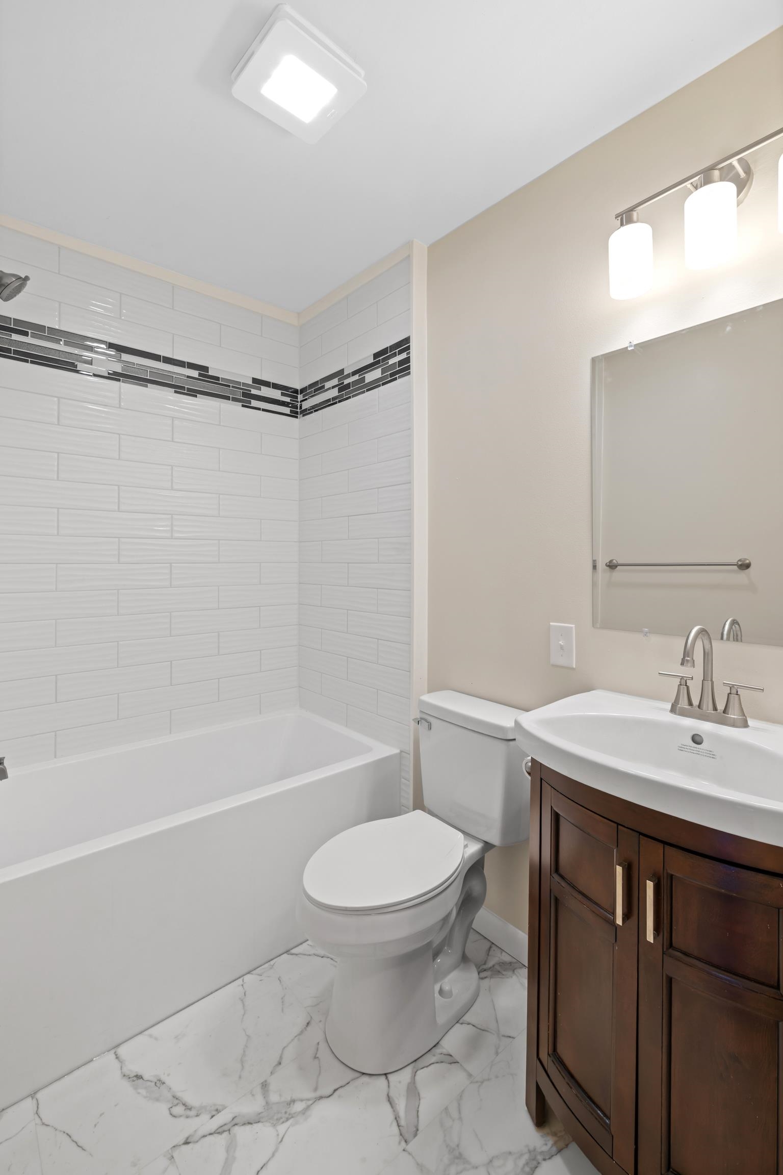 1726 Mountain Valley Road Keezletown, VA 22832 - Photo 31 of 63 a bathroom with a sink a toilet and shower