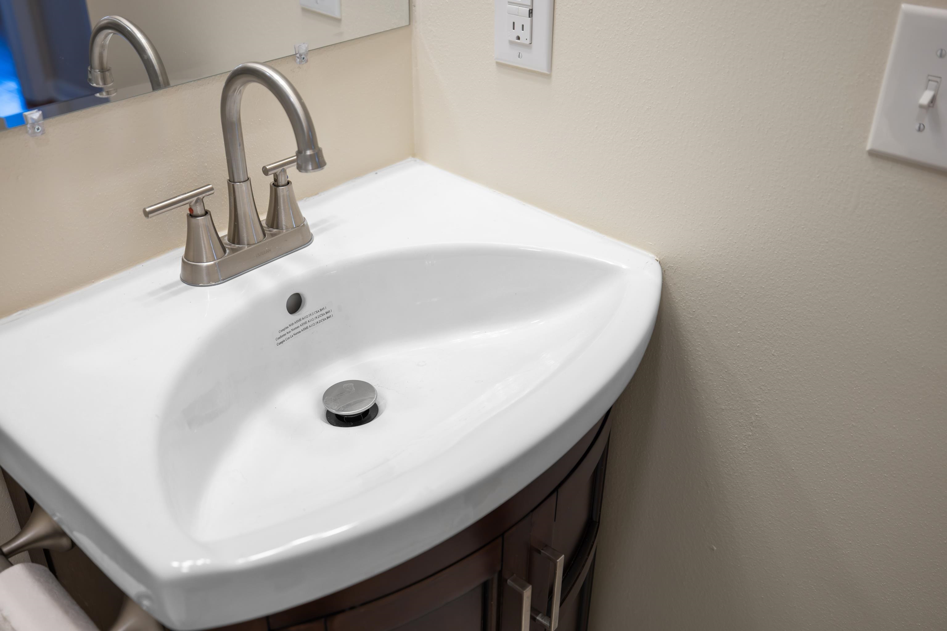 1726 Mountain Valley Road Keezletown, VA 22832 - Photo 33 of 63 a bathroom with a sink and mirror