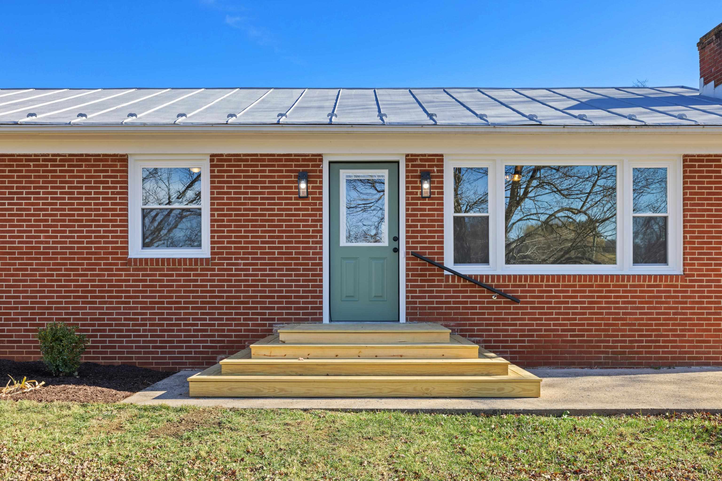 1726 Mountain Valley Road Keezletown, VA 22832 - Photo 44 of 63 a front view of a house with a yard