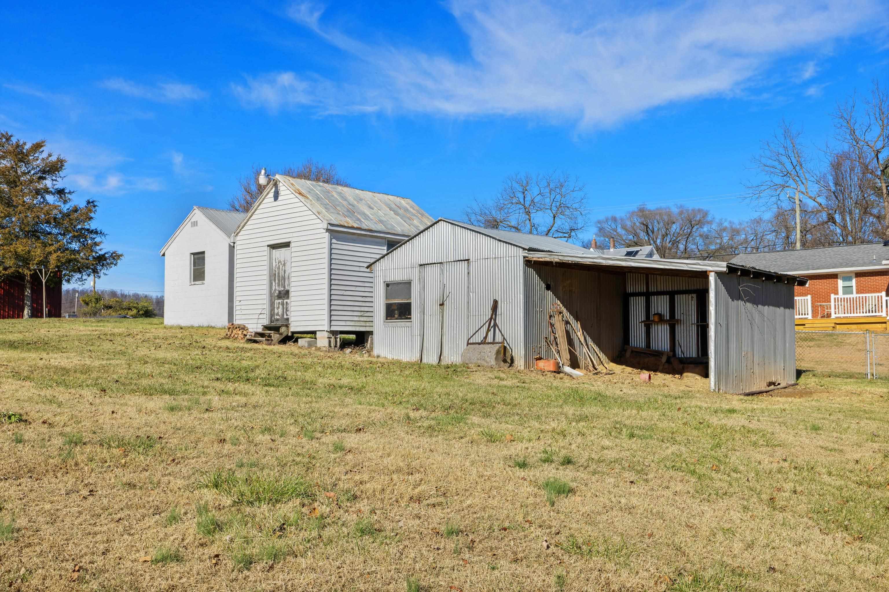 1726 Mountain Valley Road Keezletown, VA 22832 - Photo 50 of 63 a view of a house with a yard