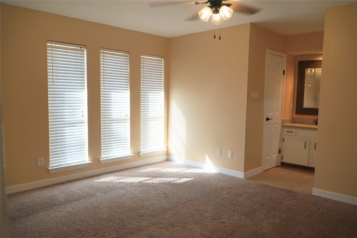 25314 Hickory Valley Lane Spring, TX 77373 - Photo 18 of 33 an empty room with windows and entrance