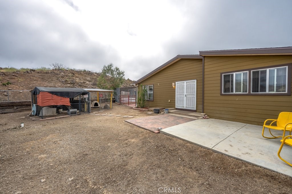 33330 Palen Road Agua Dulce, CA 91390 - Photo 55 of 56 a view of a house with backyard and sitting area