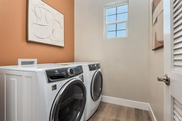 a utility room with dryer and washer