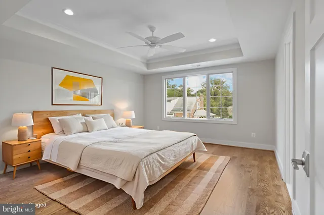 a bedroom with bed and a window