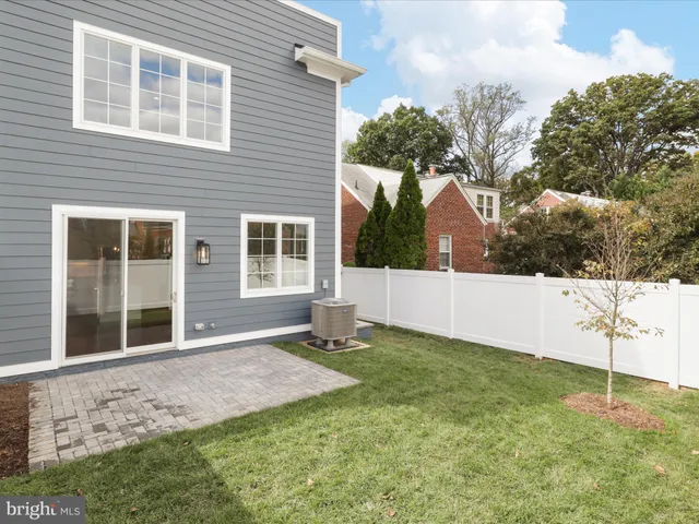 a house view with a backyard space