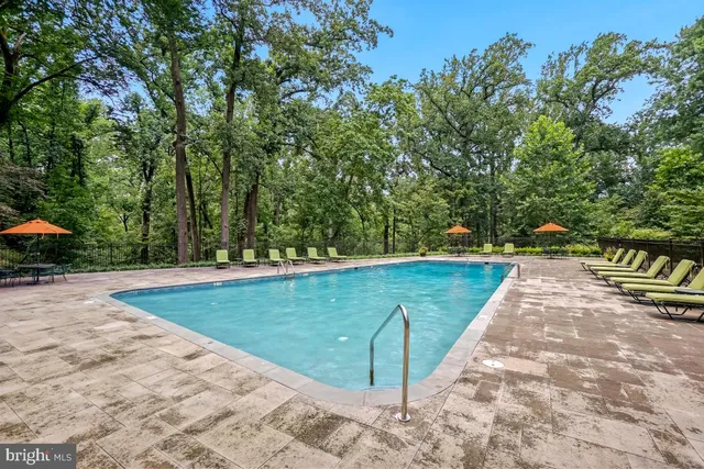 a view of a building with sitting area