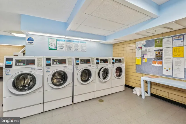 a view of a building with sitting area