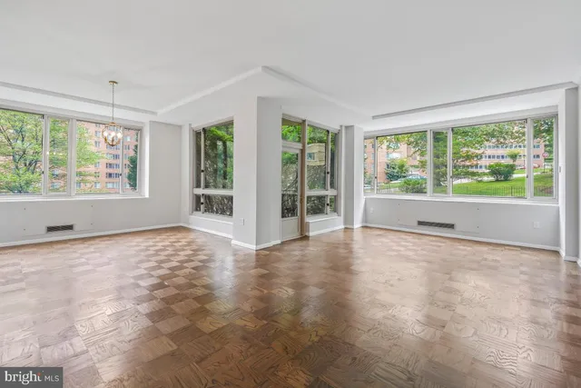 a view of an empty room with a window