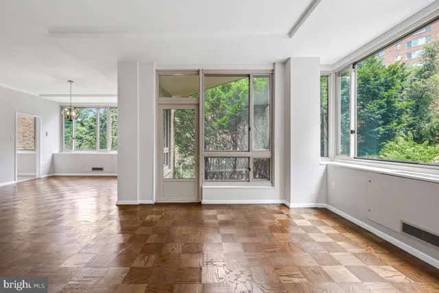 a view of an empty room with a window