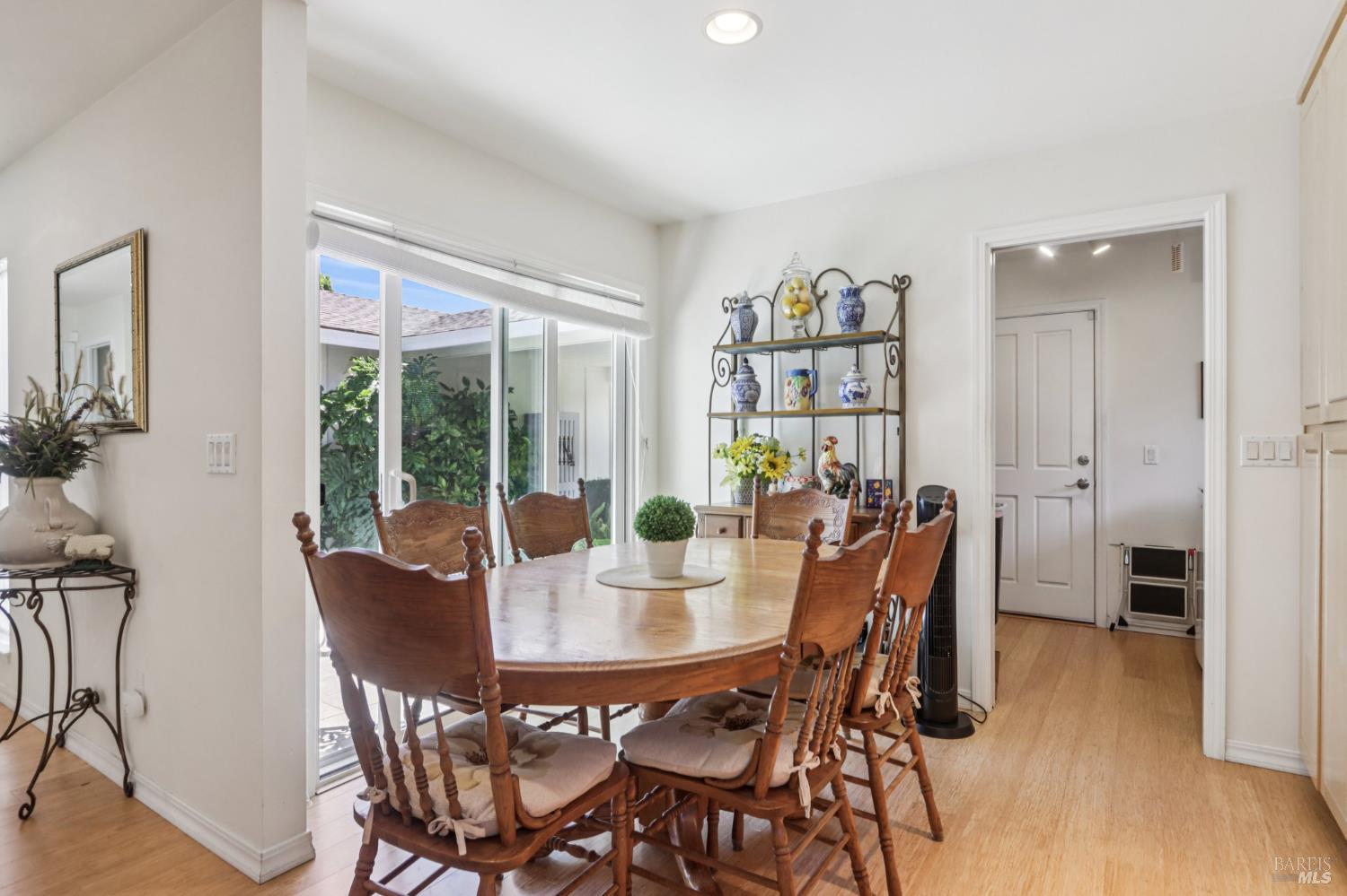 322 Mockingbird Circle Santa Rosa, CA 95409 - Photo 17 of 44 a view of a dining room with furniture window and wooden floor