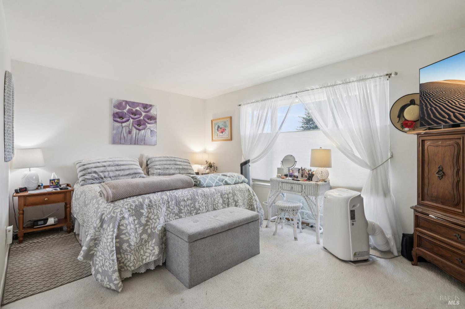 322 Mockingbird Circle Santa Rosa, CA 95409 - Photo 24 of 44 a living room with furniture and a large window