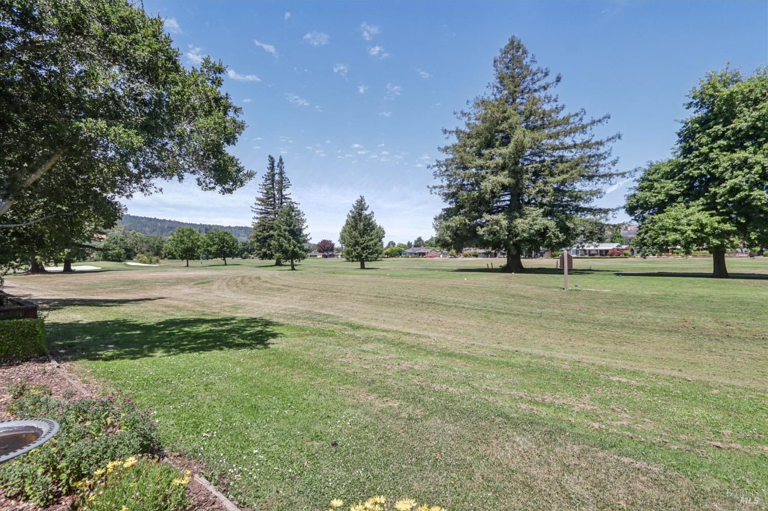 322 Mockingbird Circle Santa Rosa, CA 95409 - Photo 44 of 44 a view of a green field with trees