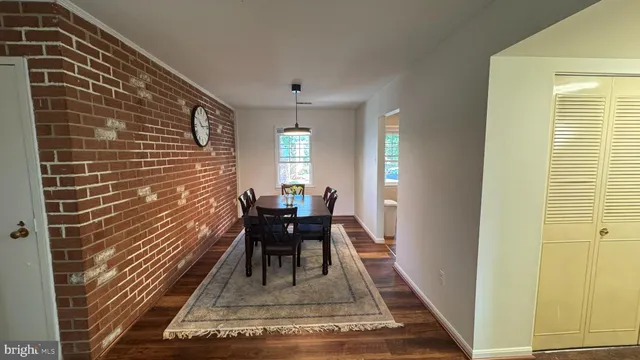 a view of a livingroom with furniture and window