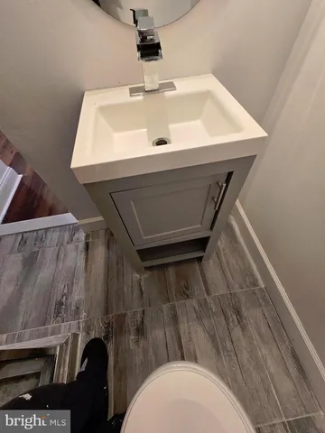a bathroom with a sink and toilet
